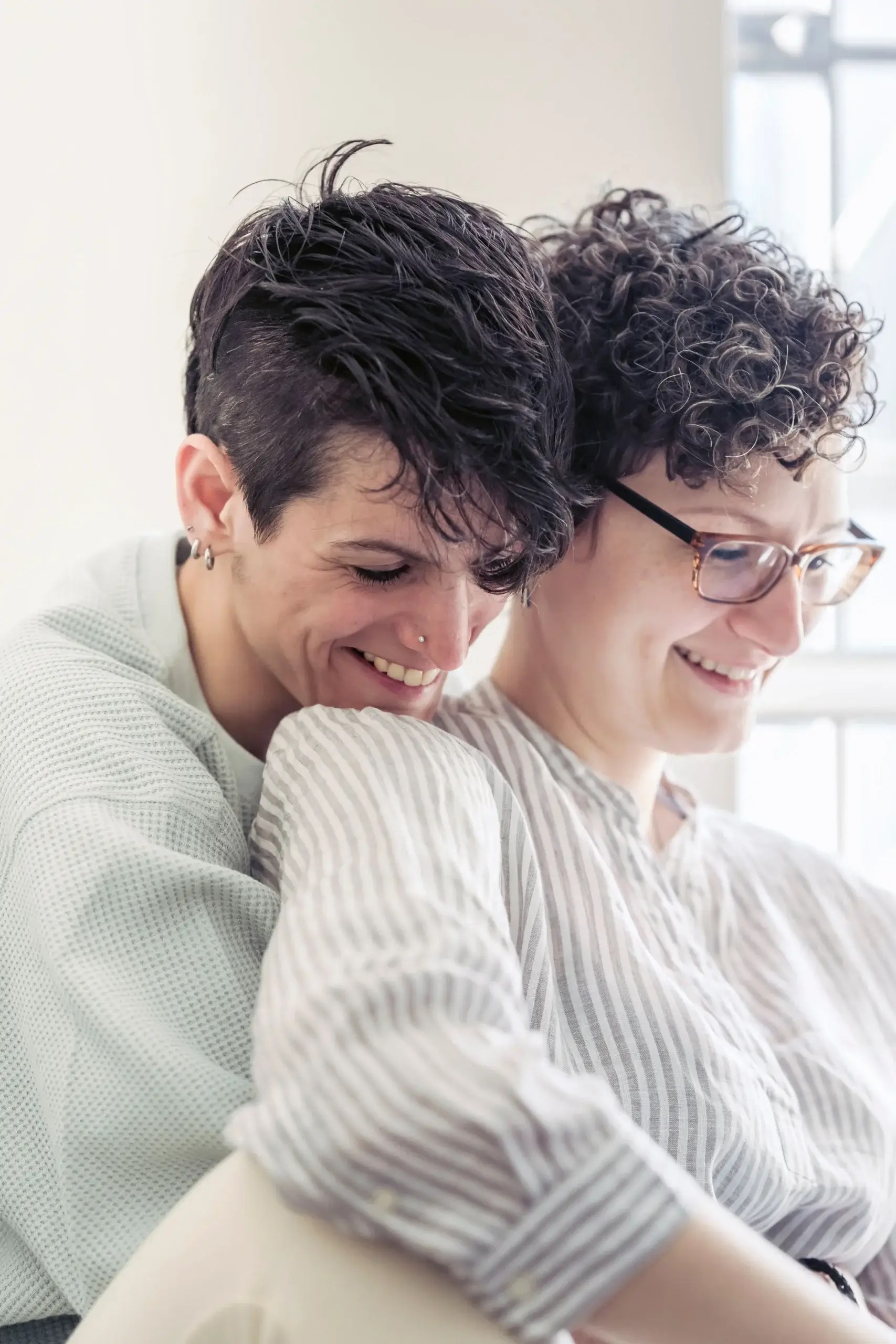 LGBTQIA+ couple sharing a close and supportive moment