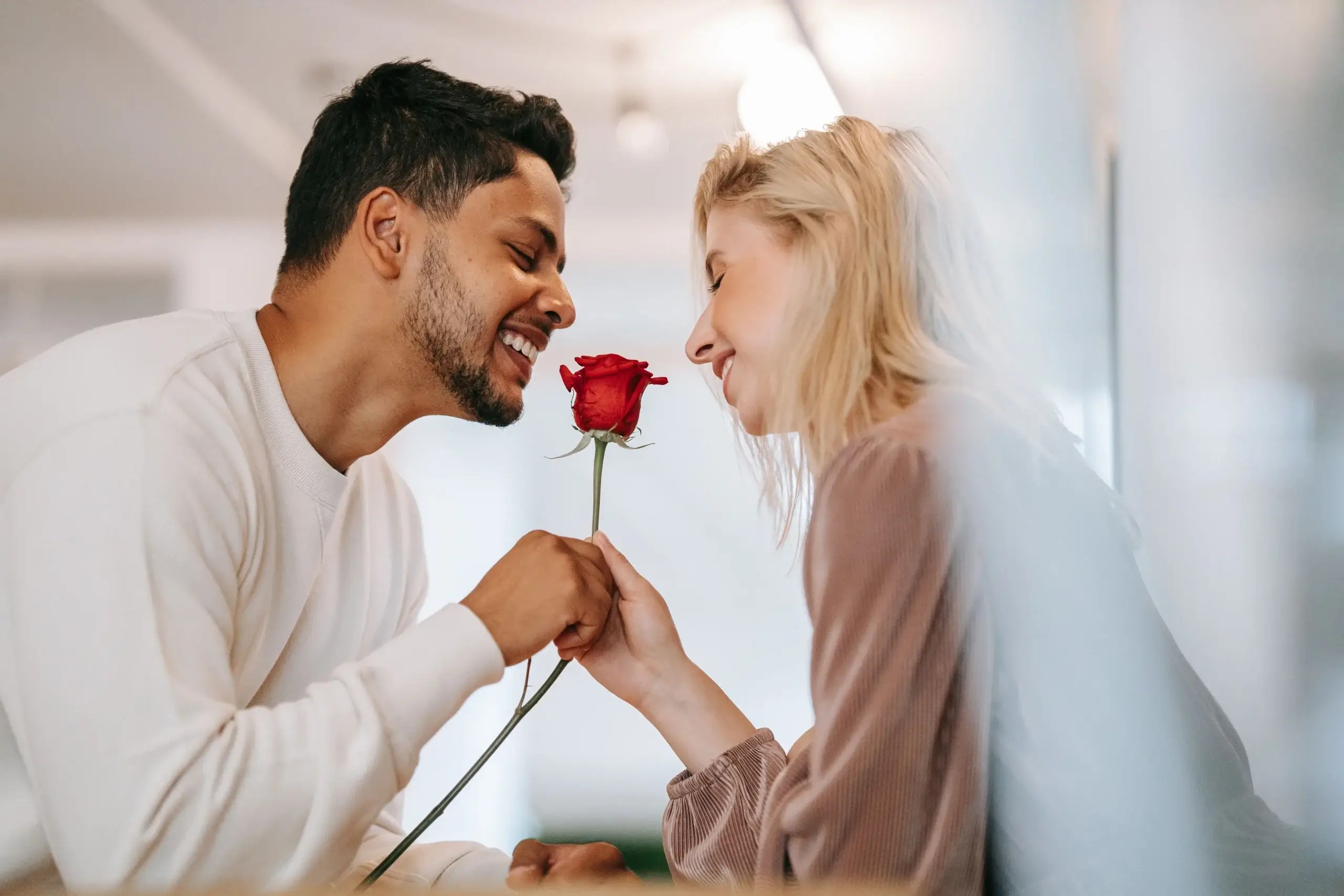 Couple sharing a romantic moment while considering major relationship differences and life choices