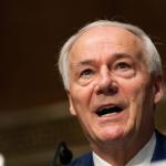 Arkansas’ Republican governor thanked President Joe Biden for depoliticizing the federal COVID-19 response