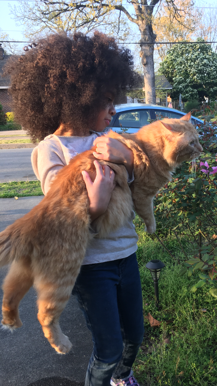 Loving small(ish) furry things brings her joy.