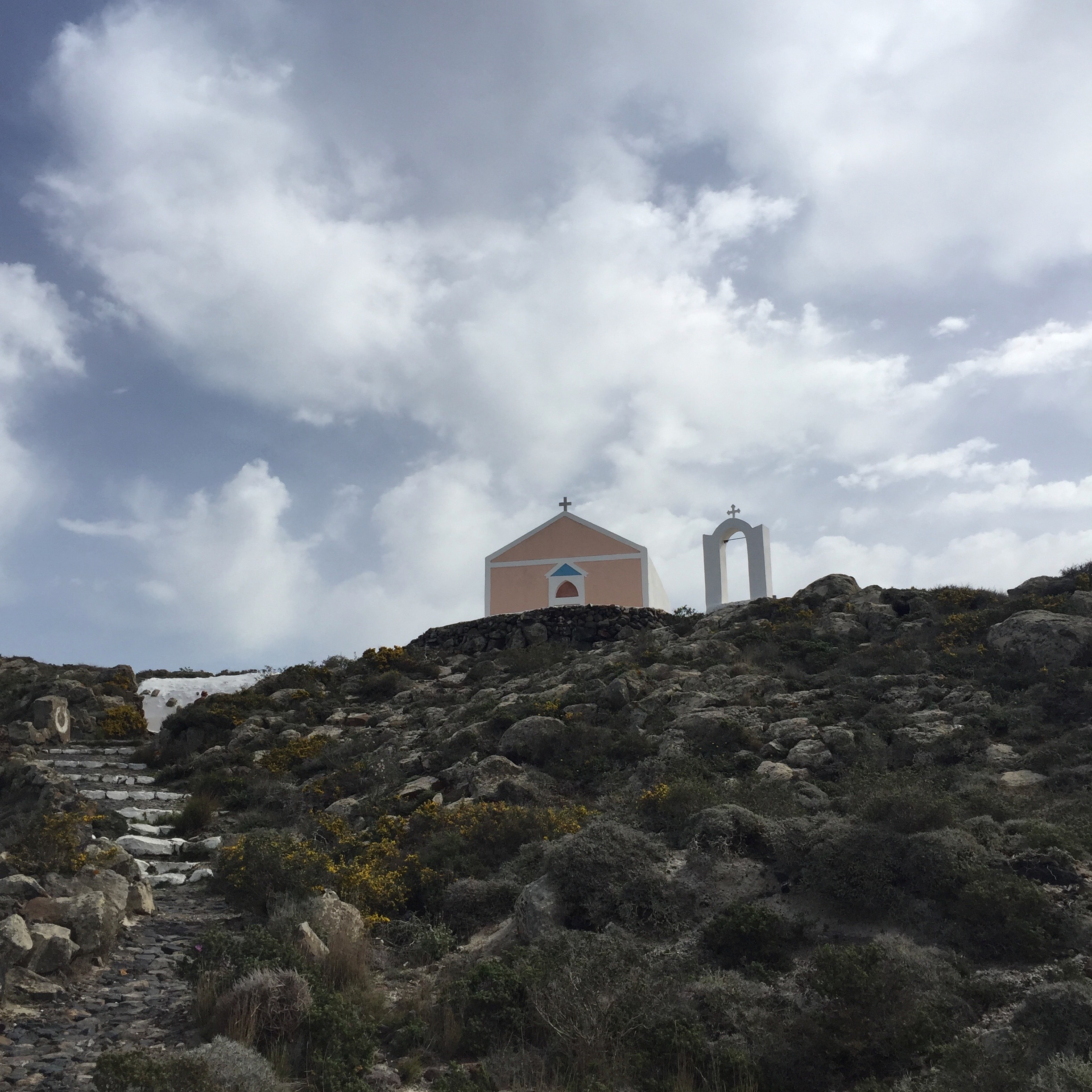 An orthodox church on top of the hill.