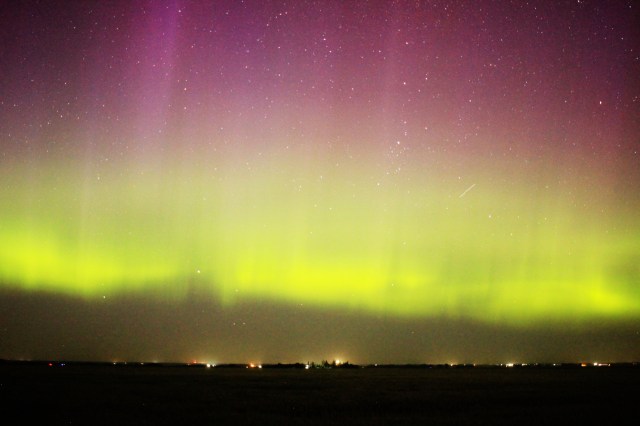 Aurora Borealis: purple pillars above a broad green band