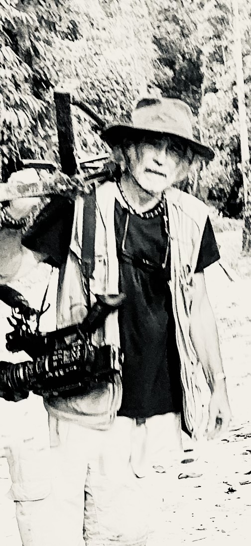 Documentary filmmaker Patrick Morell filming in Gunung Leuser rainforest, Sumatra, Indonesia