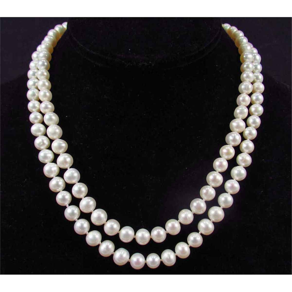 Pearl necklace stands for luxury