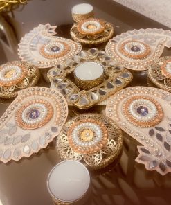 Exotic and elegant peach colour rangoli set