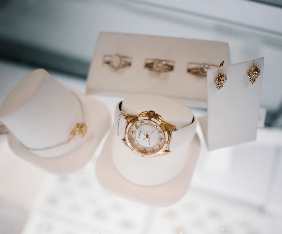 Gold watch and jewelry display