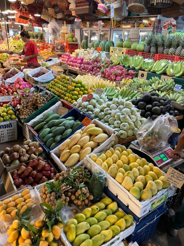 Fruit lined up neatly at a market in Bangkok Thailand