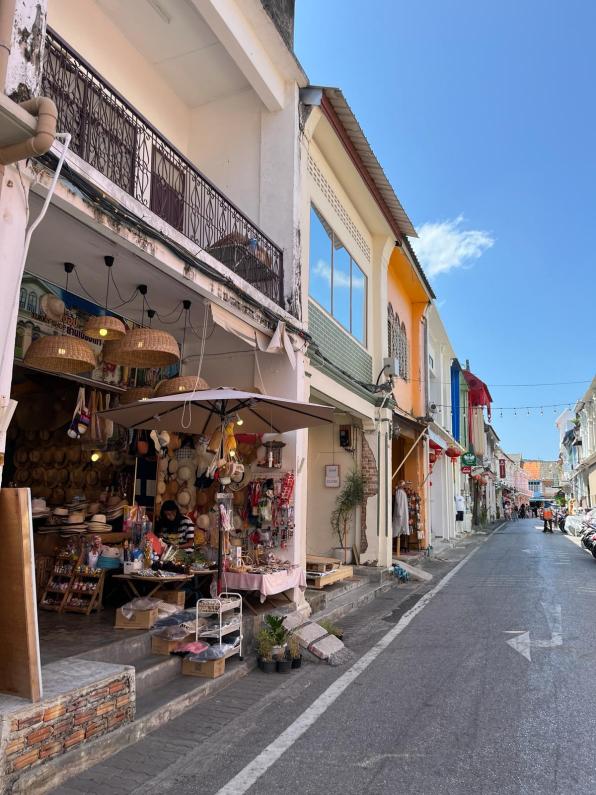Cute, colorful store fronts on a street in Old Phuket Thailand