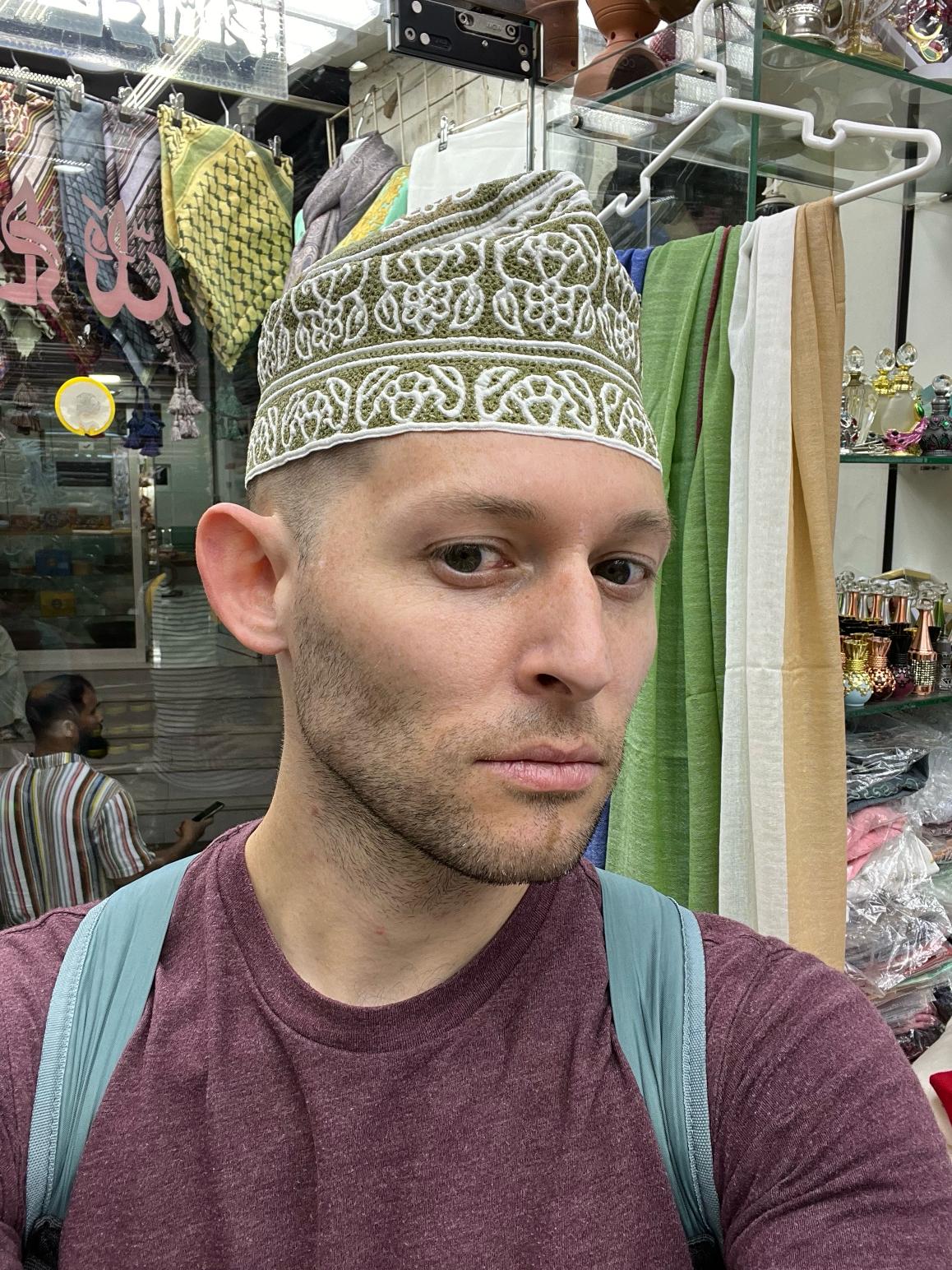 A colorful traditional kumma or woven cap worn by Omani men.