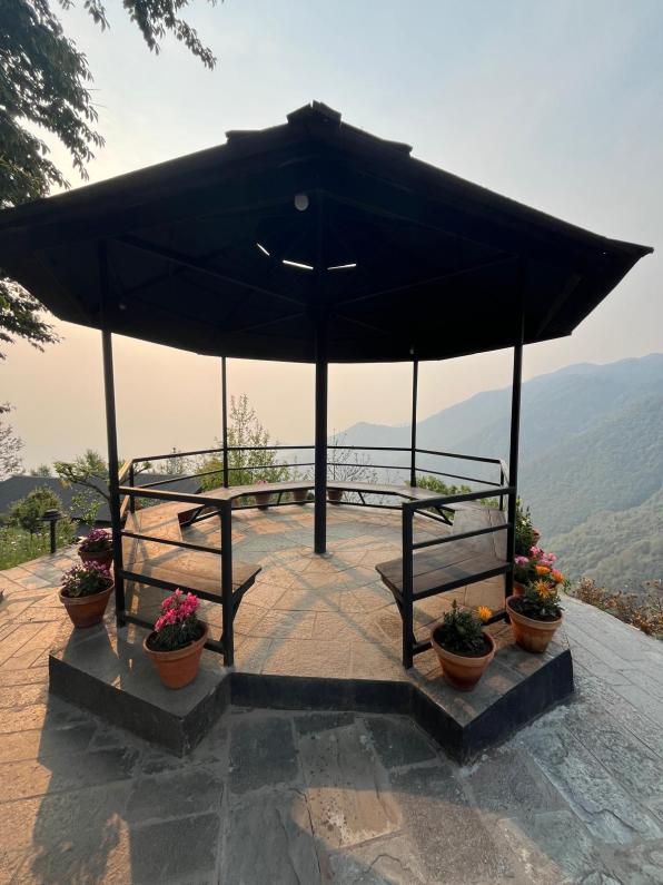 A scenic overlook of the Himalayan Mountains from Prakriti Resort in Nepal.