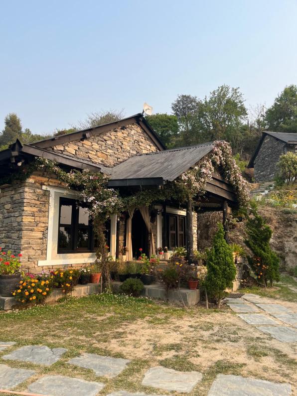 Prakriti Resort an adorable upscale farmhouse with a beautiful grand entrance in Nepal