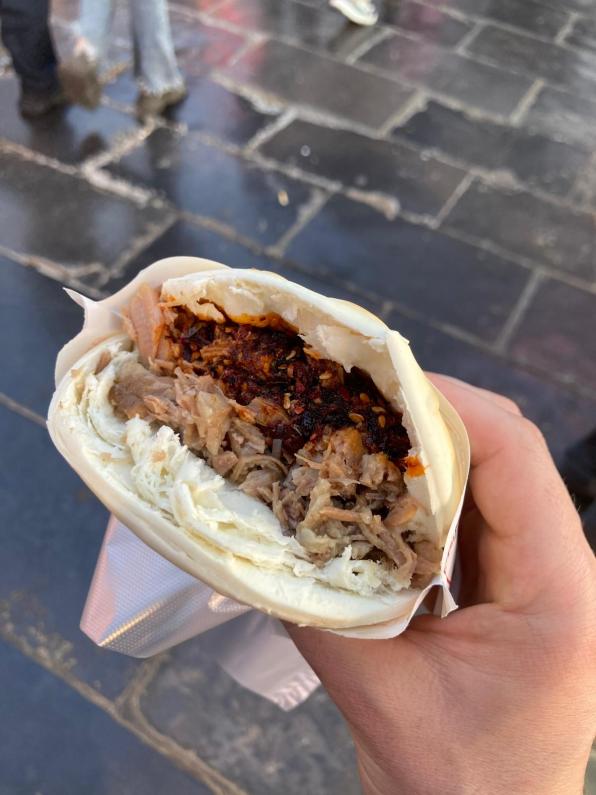 Roujiamo in Xi'an China is a delicious steamed bun filled with savory meat filling and spices