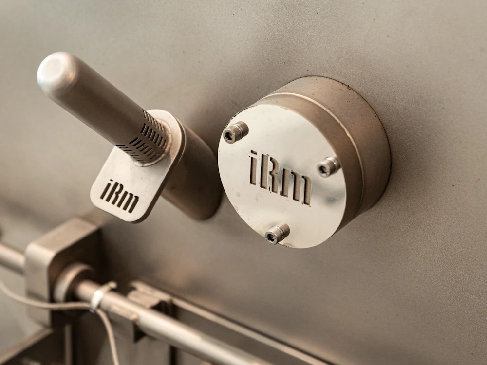 - Healthy Brew Hub A close-up of an IRM handle on a coffee roaster.