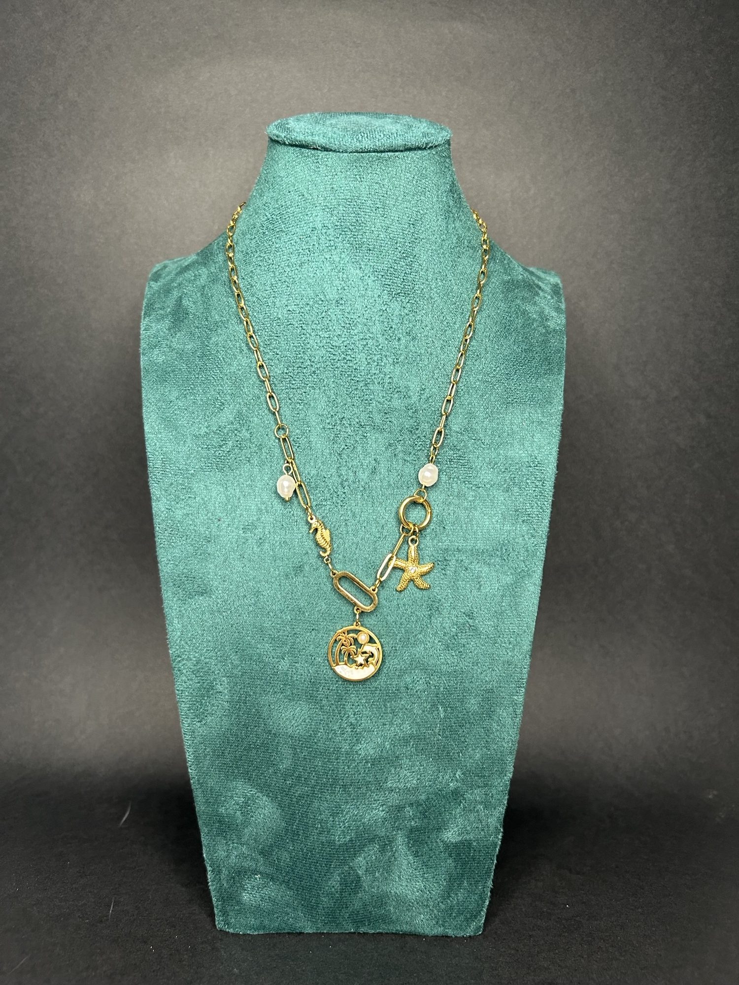 COLLAR DE ACERO MODELO: PALMERAS Y DELFINES