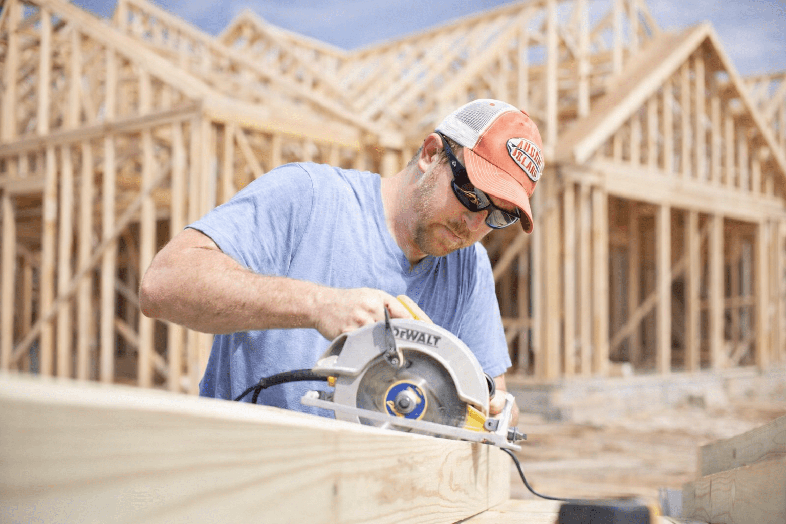Wade working a circular saw