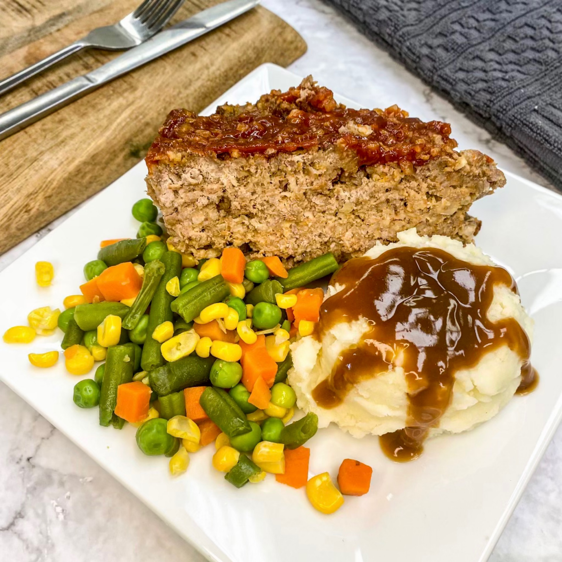 16 meatloaf, mashed potatoes & veg.