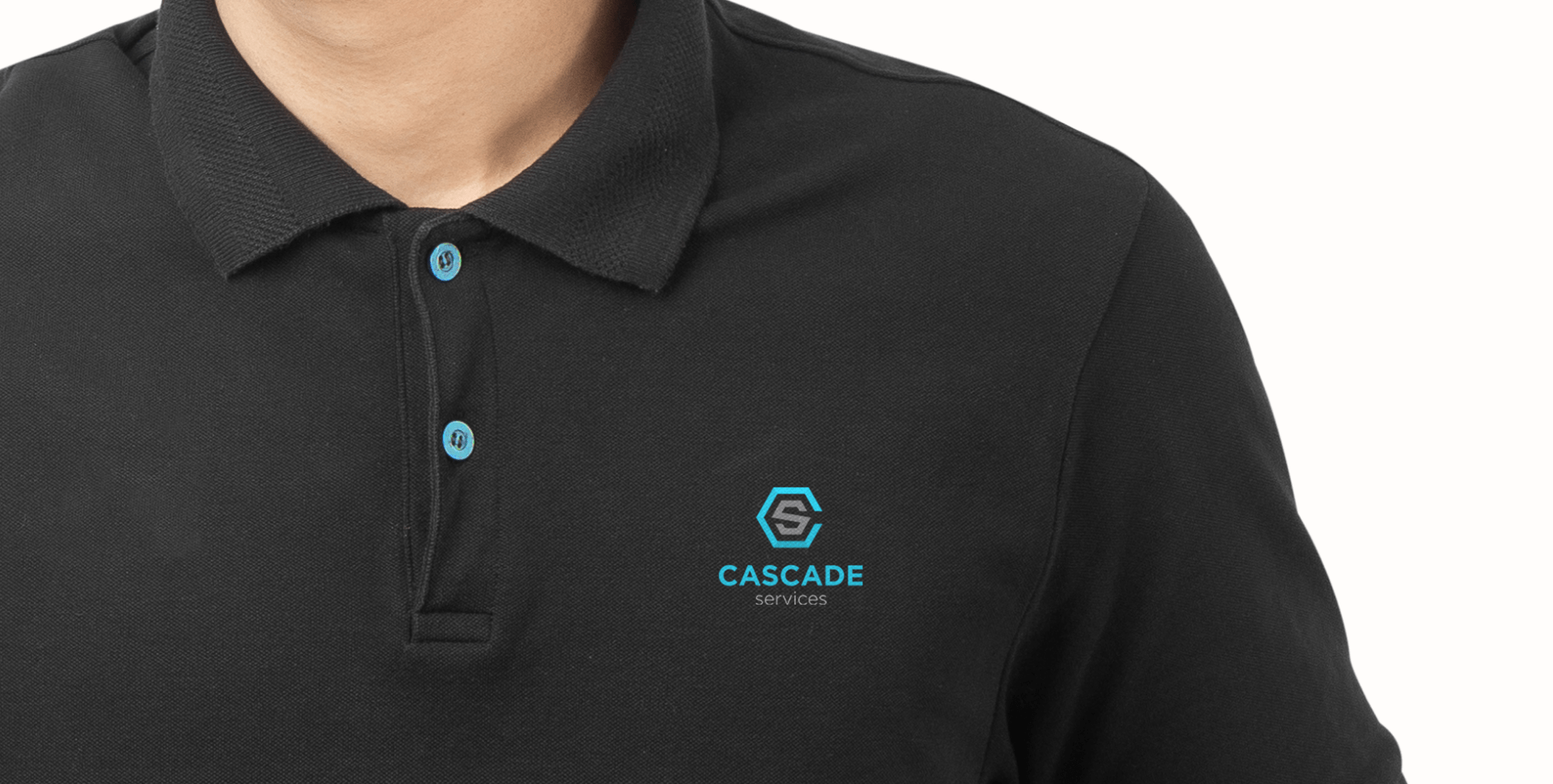 Cascade Services logo design on a polo shirt