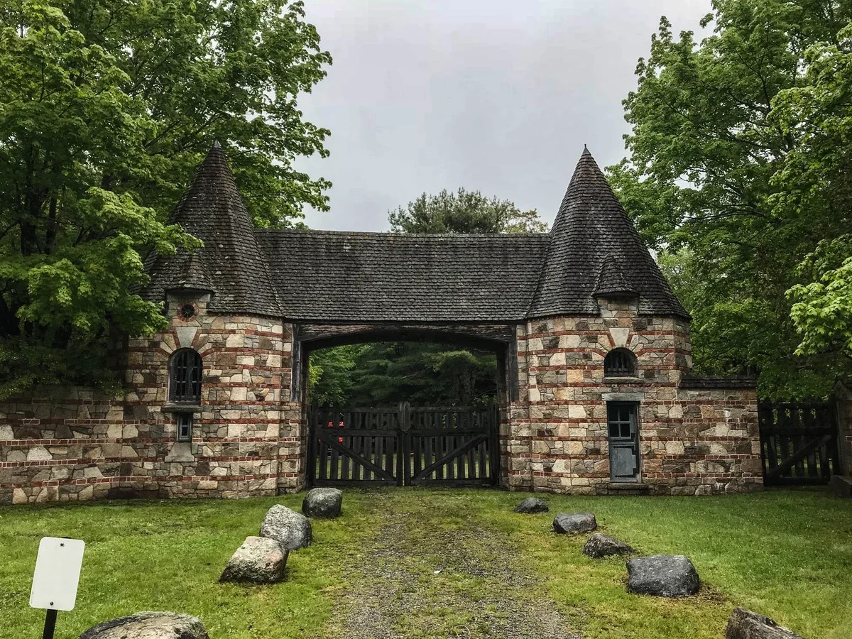 Historical photograph of Acadia carriage-road gate; not current foliage or access evidence