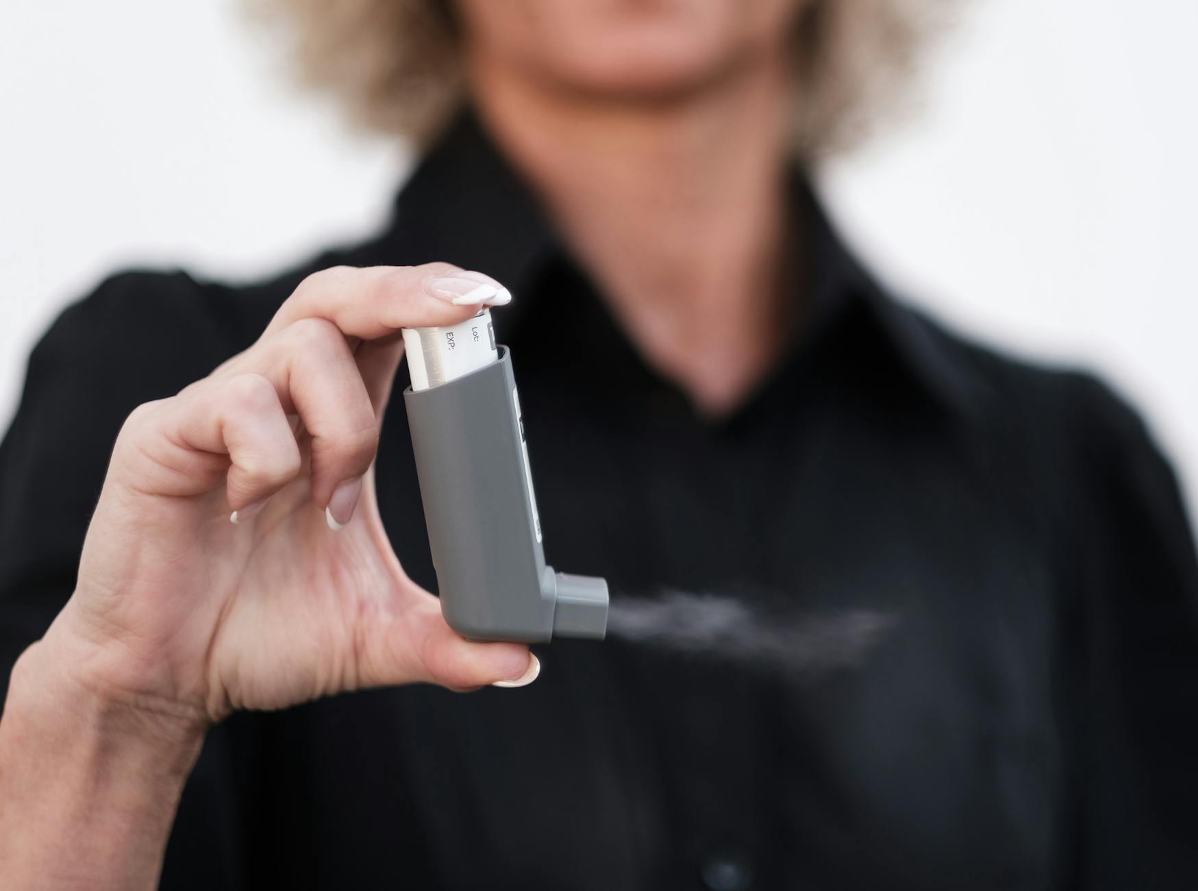 close up of an inhaler in use indoors