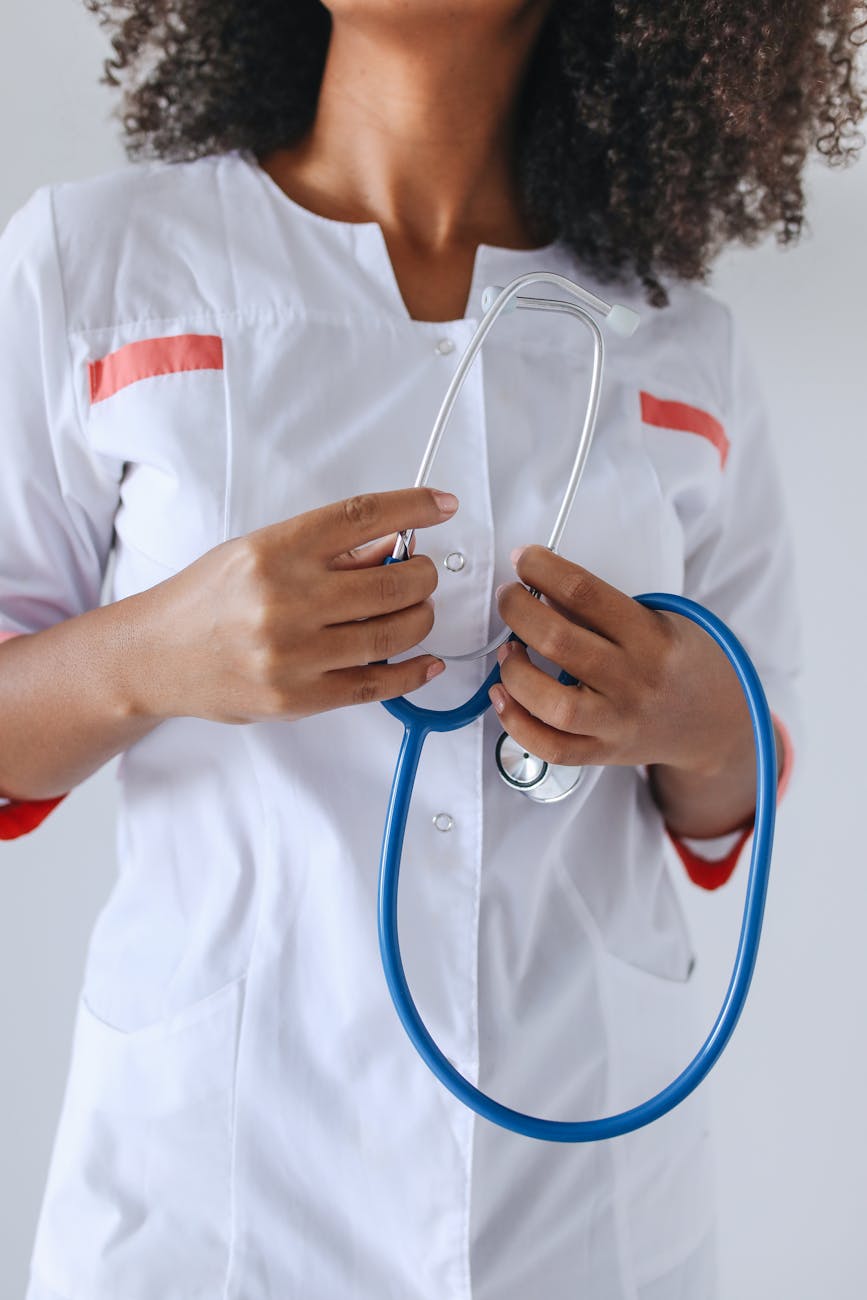 hands holding stethoscope