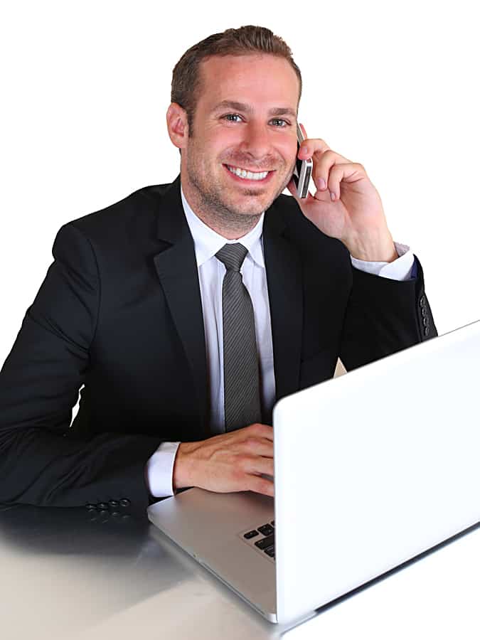 branding photo of man on the phone with his laptop