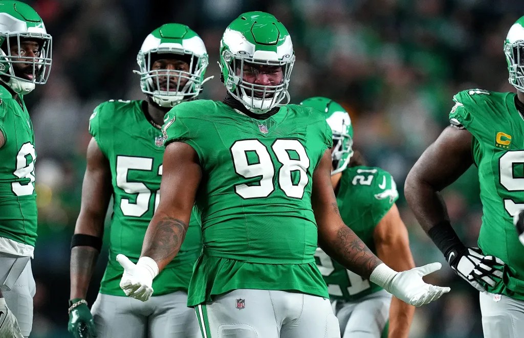 Jalen Carter amused in Kelly Green
