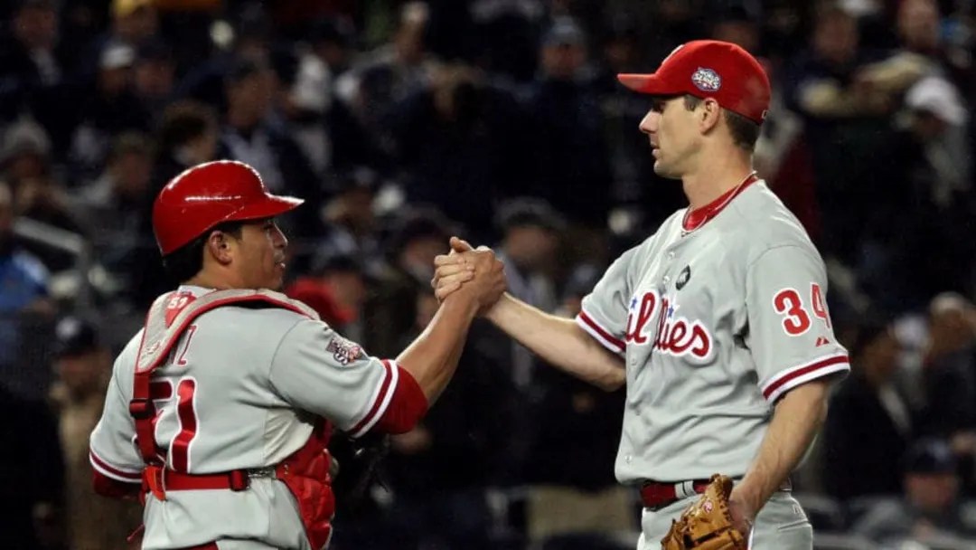 Cliff Lee celebrates with Carlos Ruiz as the Phillies win game 1 of the 2009 World Series against the Yankees