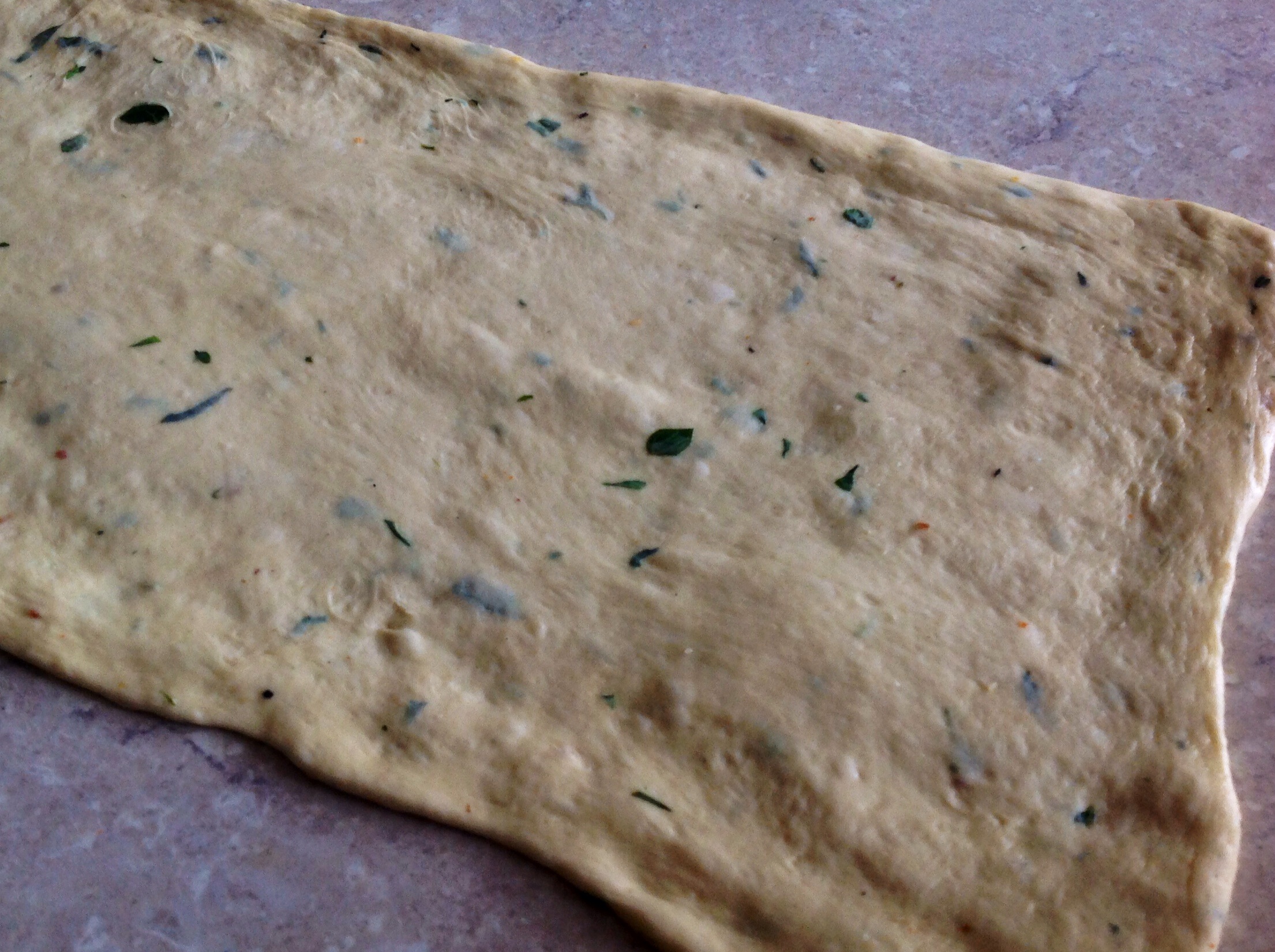 Rolled out very thinly