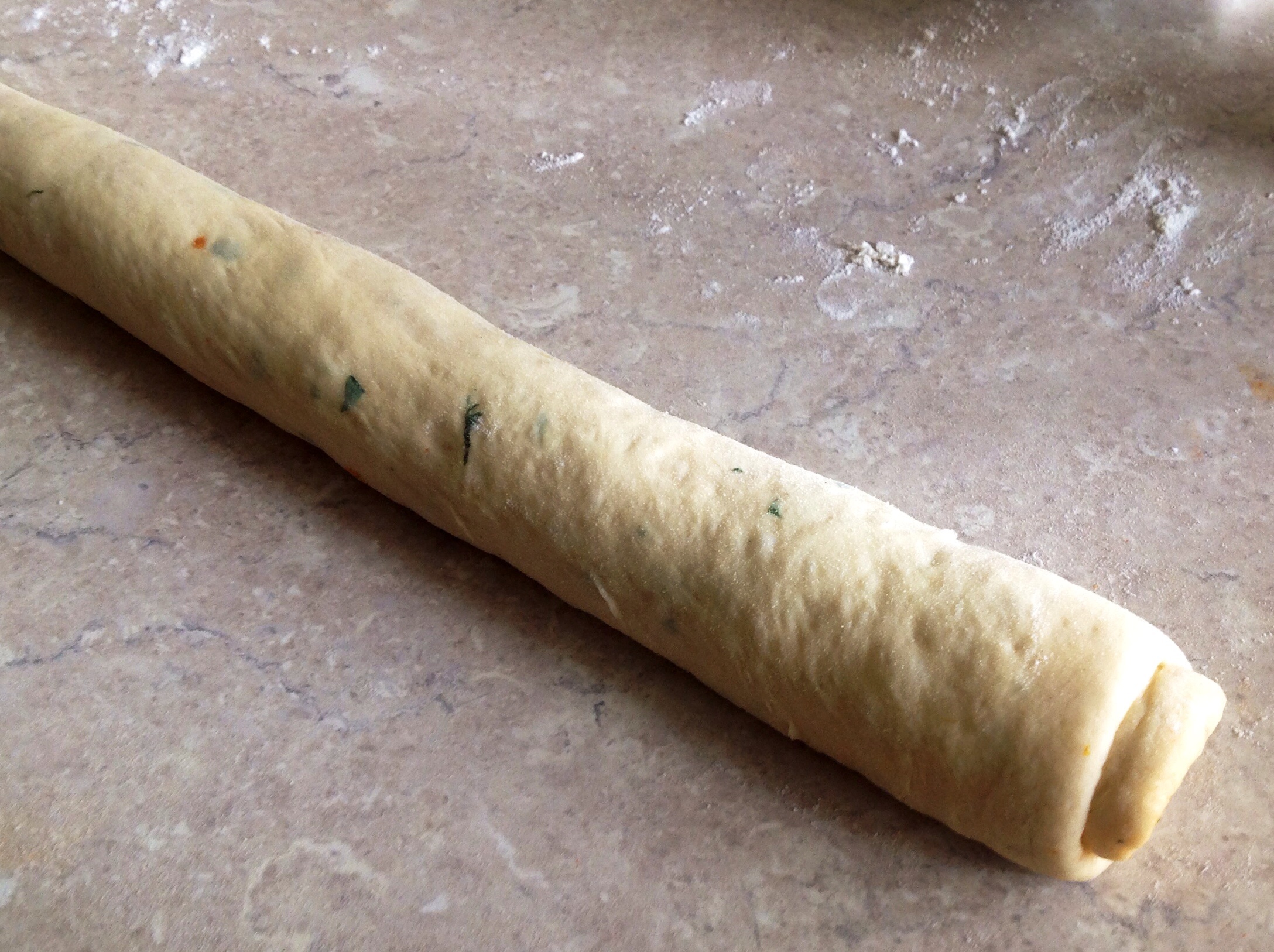 Rolled up with seal underneath