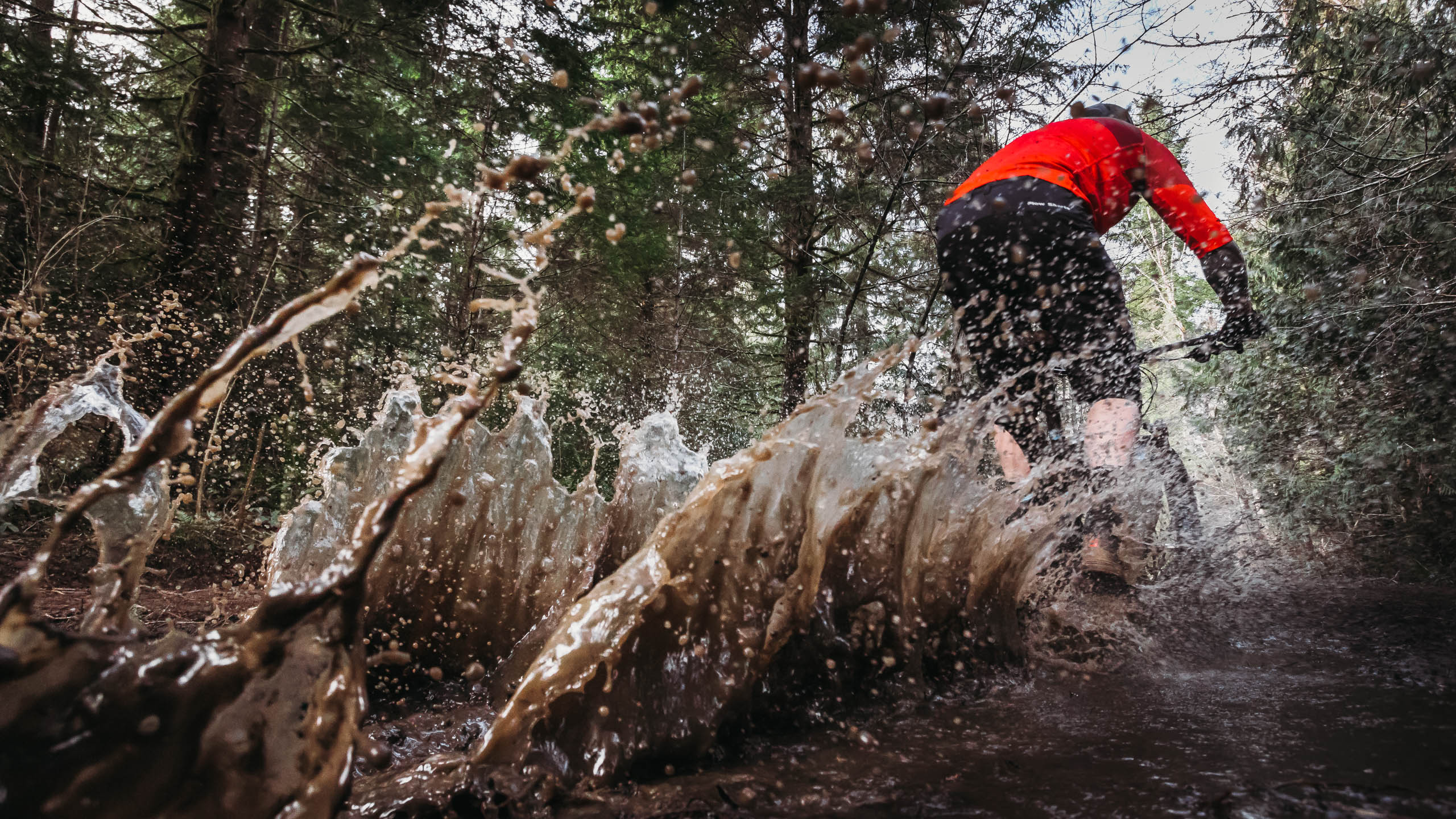 mountain biker splash puddle