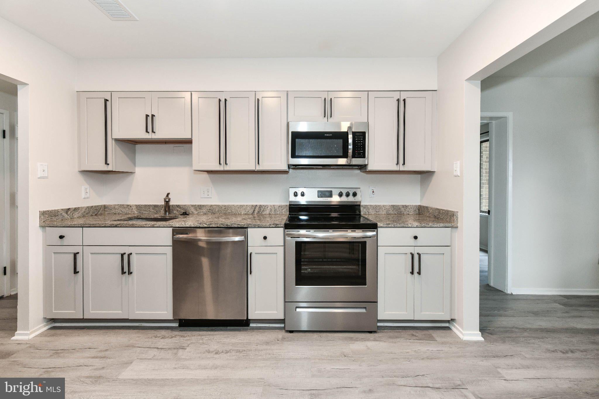 Photo of 507 Florida Avenue #103, HERNDON, VA 20170 (MLS # VAFX2333500)
