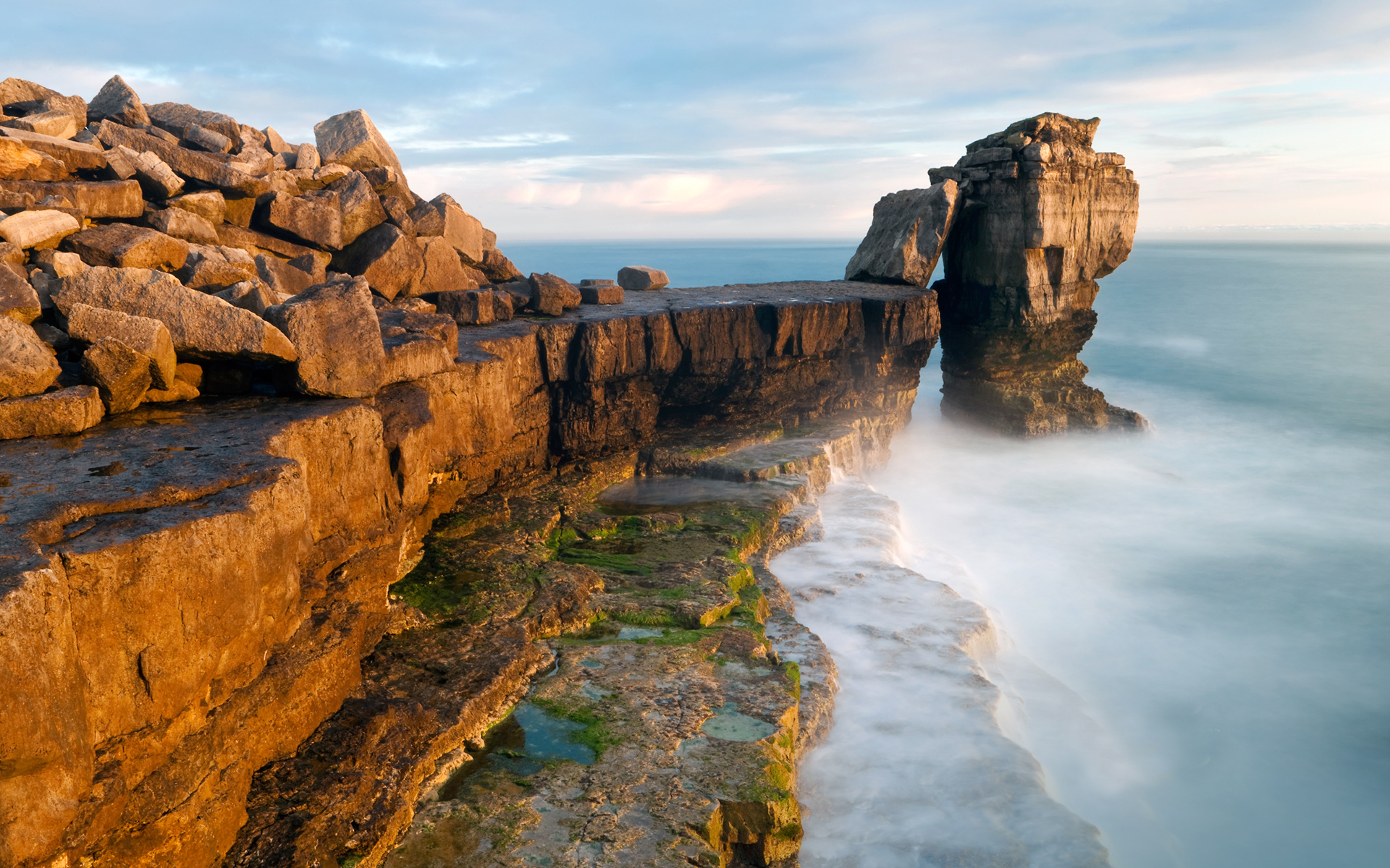 Majestic coastal cliffs embraced by nature’s calm