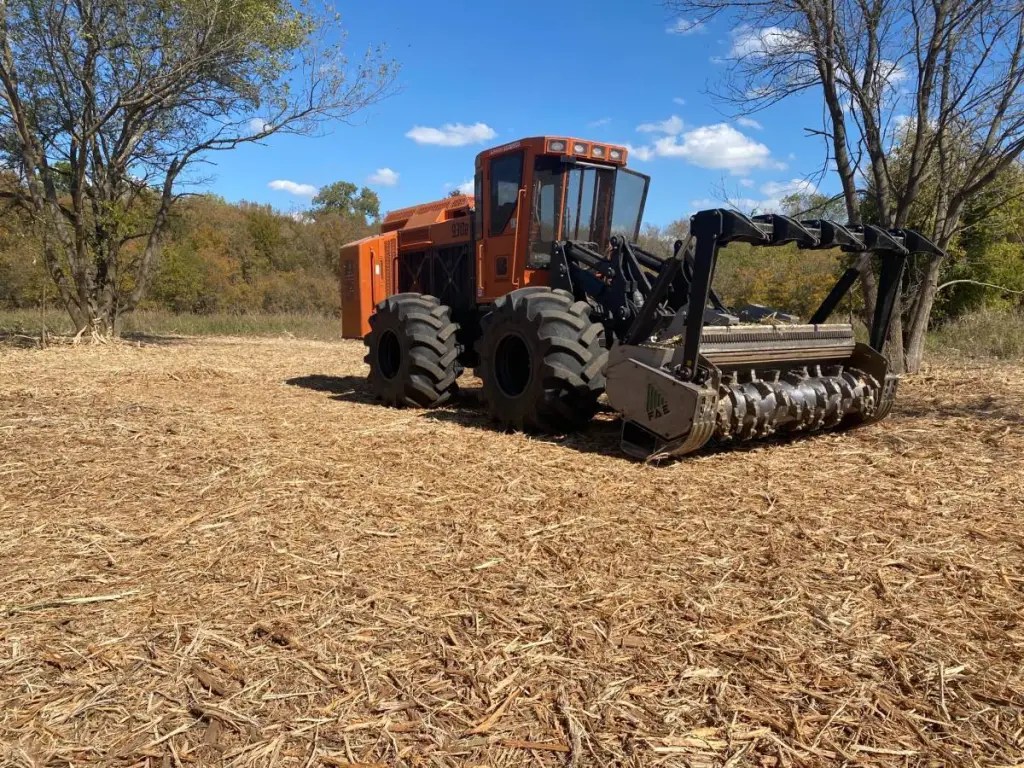 High horsepower forestry mulcher on freshly mulched Texas ground