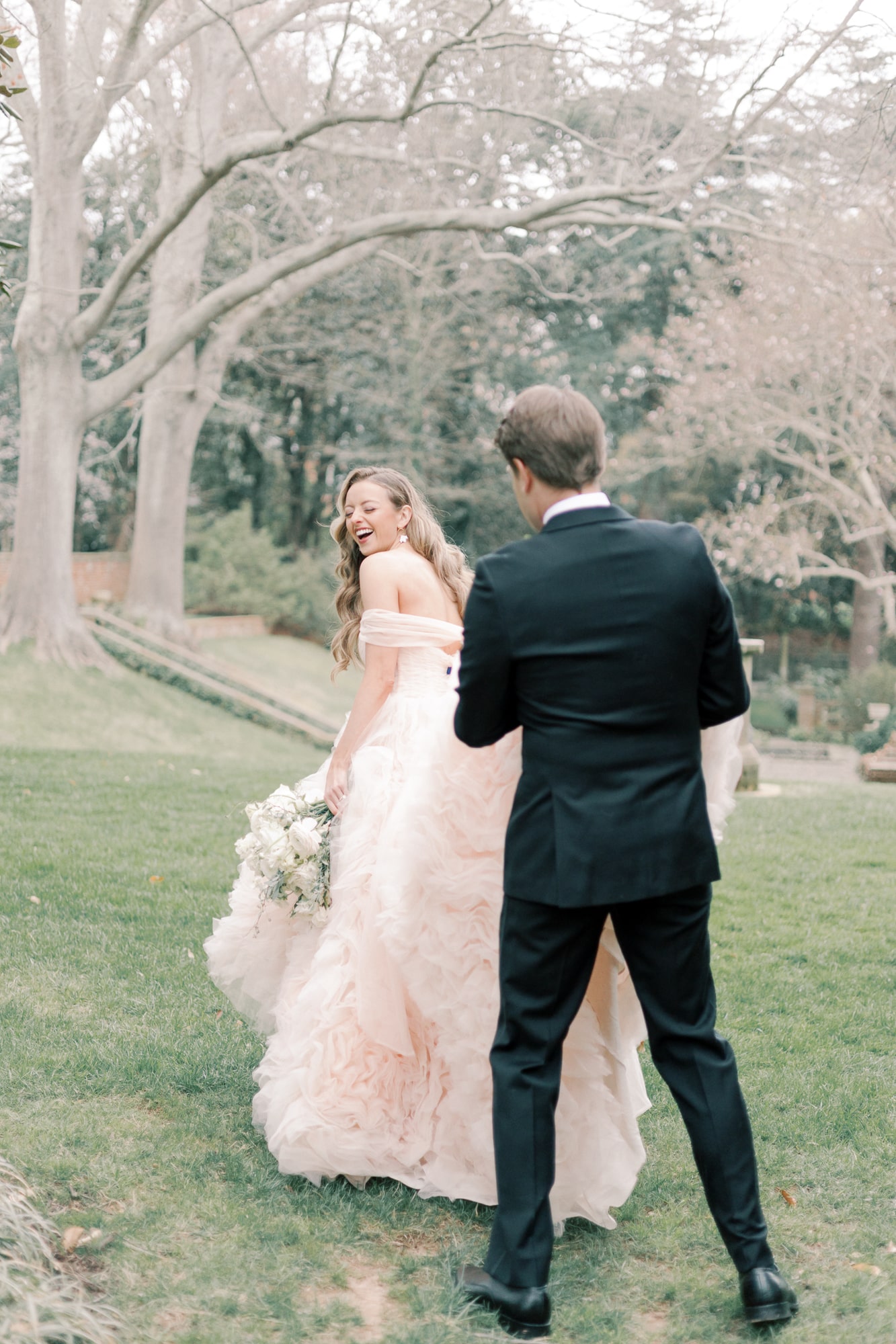 The Josefina gown by Morilee, available at Pierre's Bridal, Prom, & Tuxedo, a bridal shop in Lansing, Michigan. The Josefina gown is a blush pink wedding dress covered in tulle rosettes. This pink ballgown is the focal point of this dreamy fairytale wedding, featuring pastel flowers and a castle venue at the Virginia House.