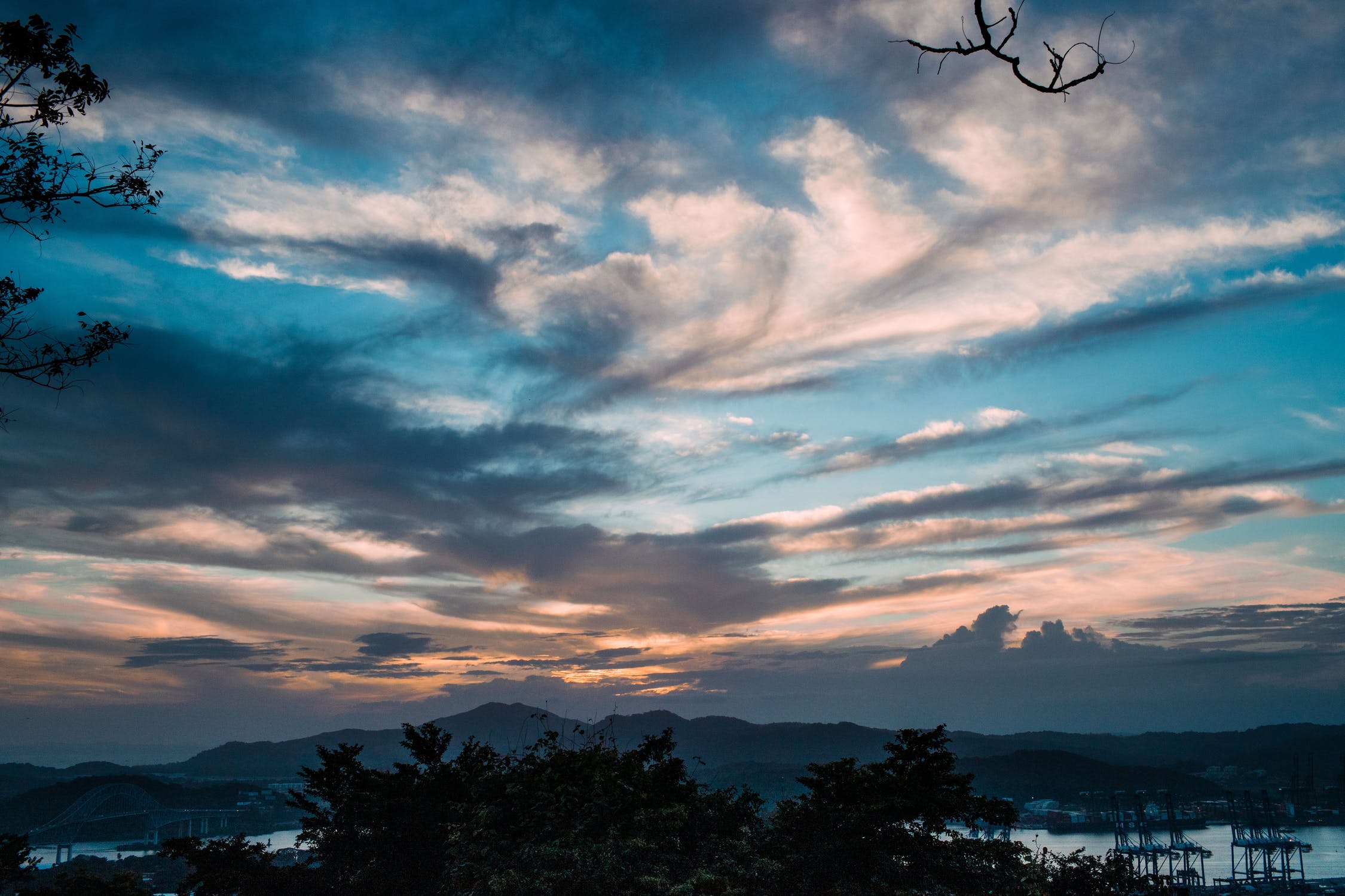 dramatic blue and peach sky at sunset