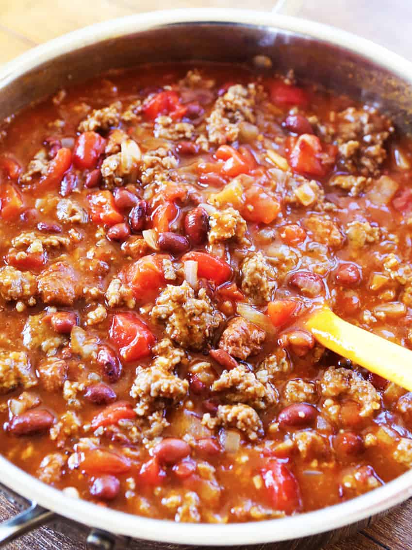 With coffee, stout beer, smoky bacon, and three kinds of chiles, this recipe makes one vibrant pot of chili.