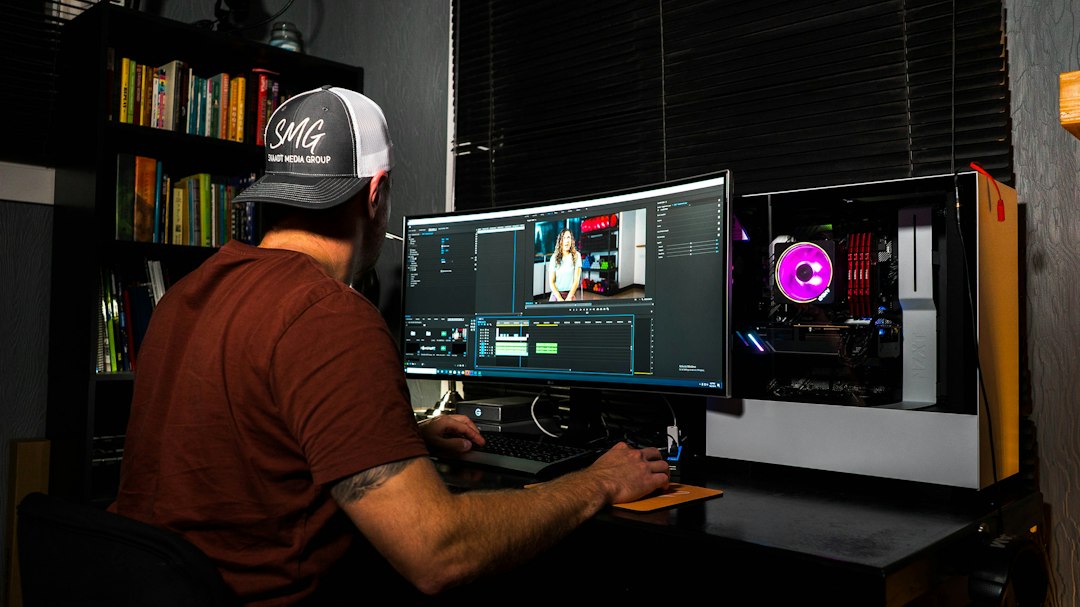 Photo editor working on a computer workstation