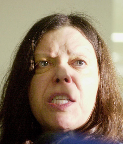 Marjorie Diehl-Armstrong snarls at reporters and photographers at the Erie County Courthouse on January 20, 2004, after her preliminary hearing in the shooting death of her live-in boyfriend Jim Roden. JANET B. KUMMERER/ERIE TIMES-NEWS