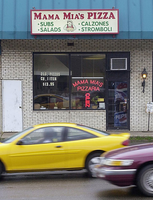 At 1:30 p.m. on August 28, 2003, an order phoned in to this pizza parlor sent Brian Wells on his way in the bank-robbery plot that would end in his bombing death at 3:18 p.m. Wells, 46 years old, had worked at Mama Mia’s nearly a decade. ISAAC BREKKEN/ERIE TIMES-NEWS