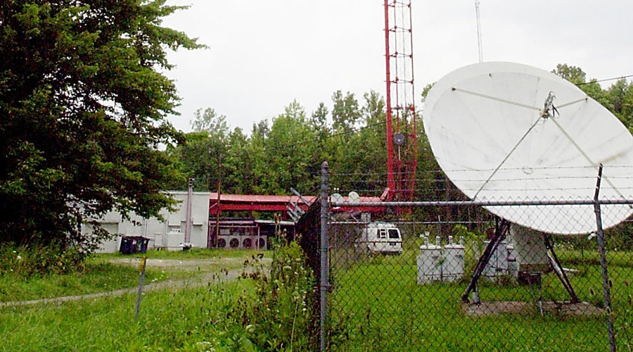 Brian Wells delivered his pizza order by driving his Geo Metro down a dirt road to this clearing, the location of the transmission tower for WSEE-TV, the CBS affiliate in Erie, Pennsylvania. He had the collar bomb locked to his neck in the clearing. RICH FORSGREN/ERIE TIMES-NEWS