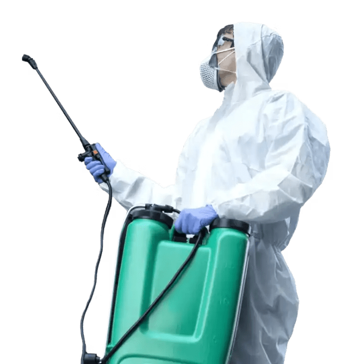 a person in a white suit with a green container