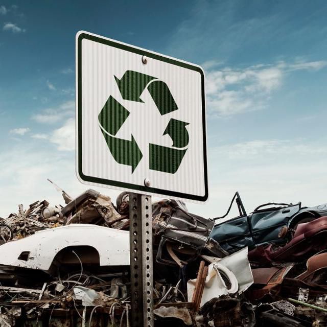 Recycling symbol sign representing circular economy and material reuse
