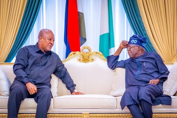 President Mahama of Ghana seated with Nigeria's President Bola Tinubu.