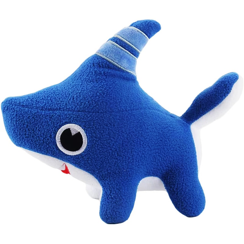 Adorable plush shark in front of a white background.