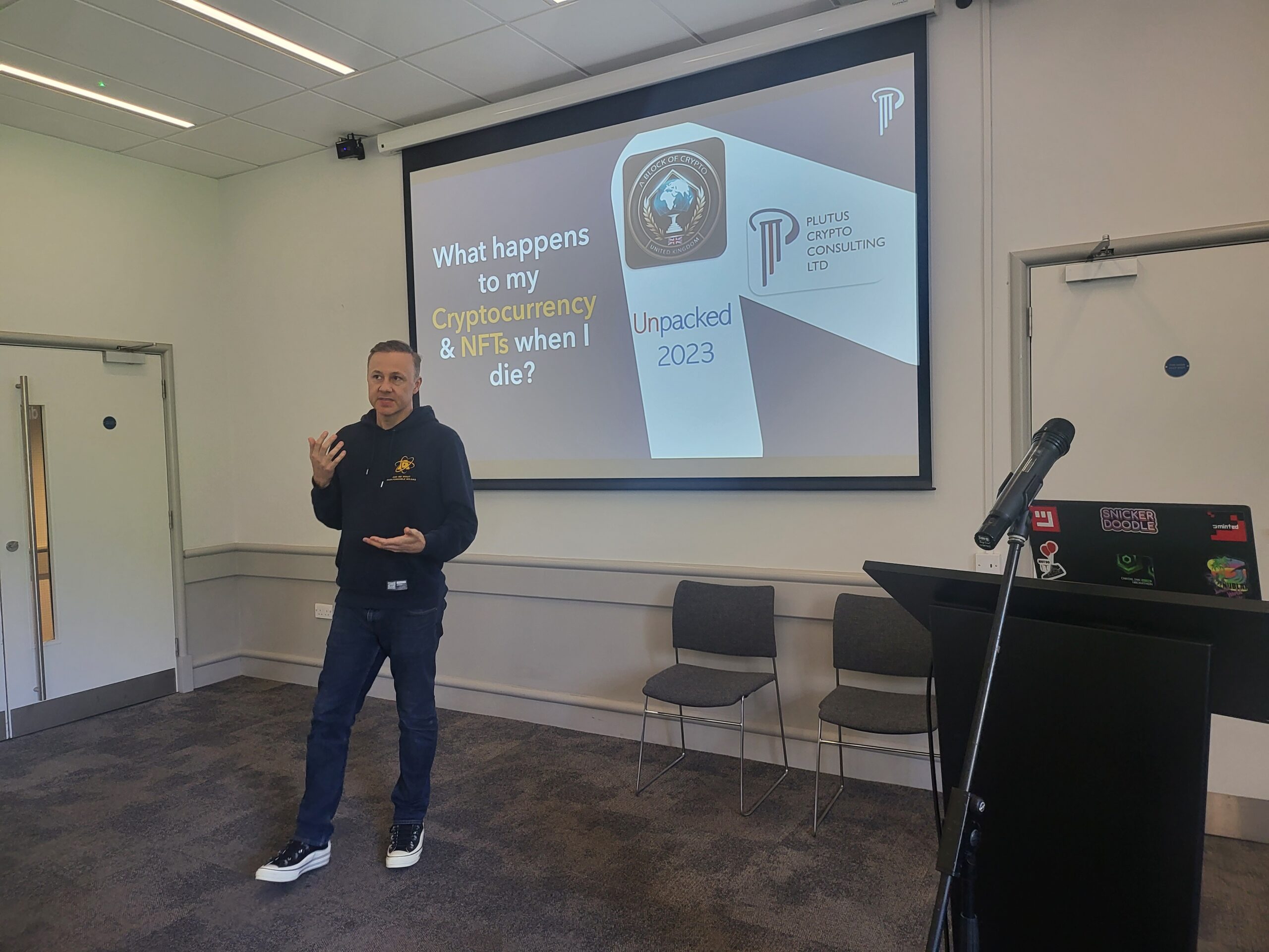 Simon Dyer presenting a cryptocurrency estate planning session at Unpacked 2023