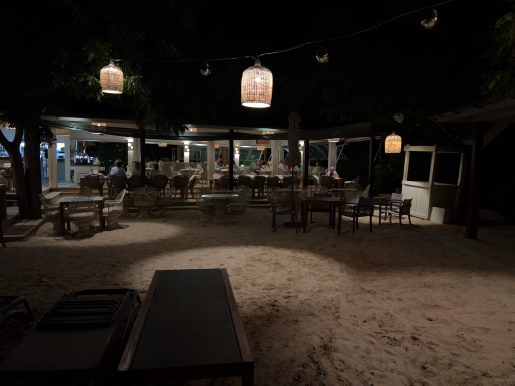 Outdoor dining area at night.