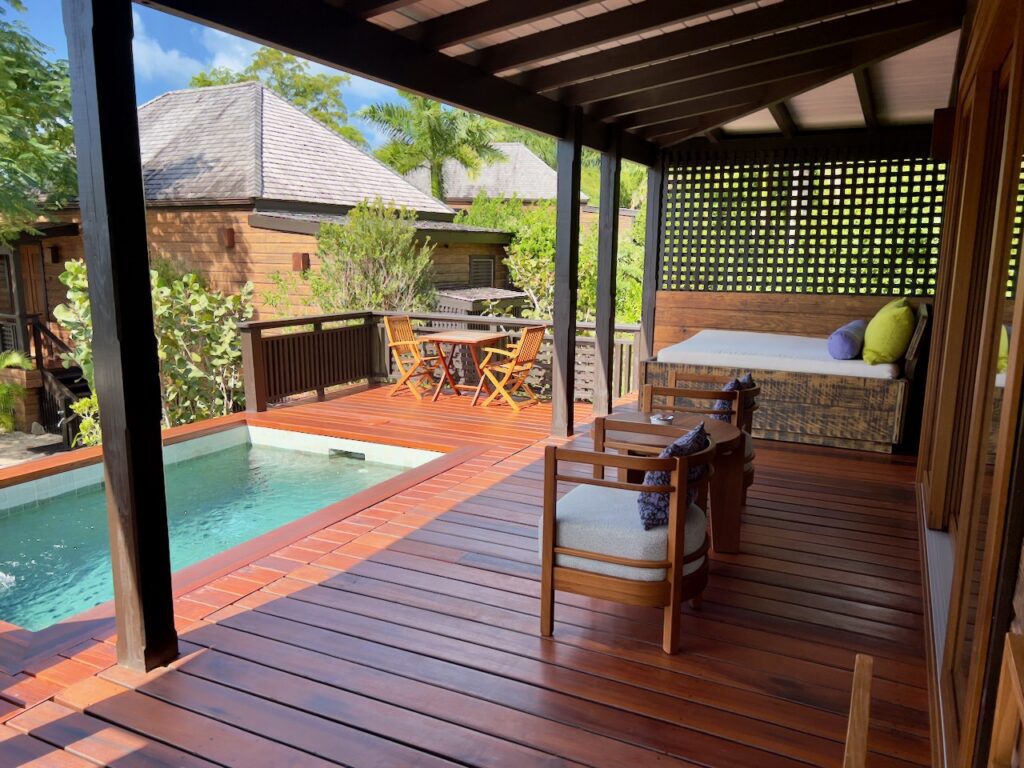 Cozy outdoor deck with pool.