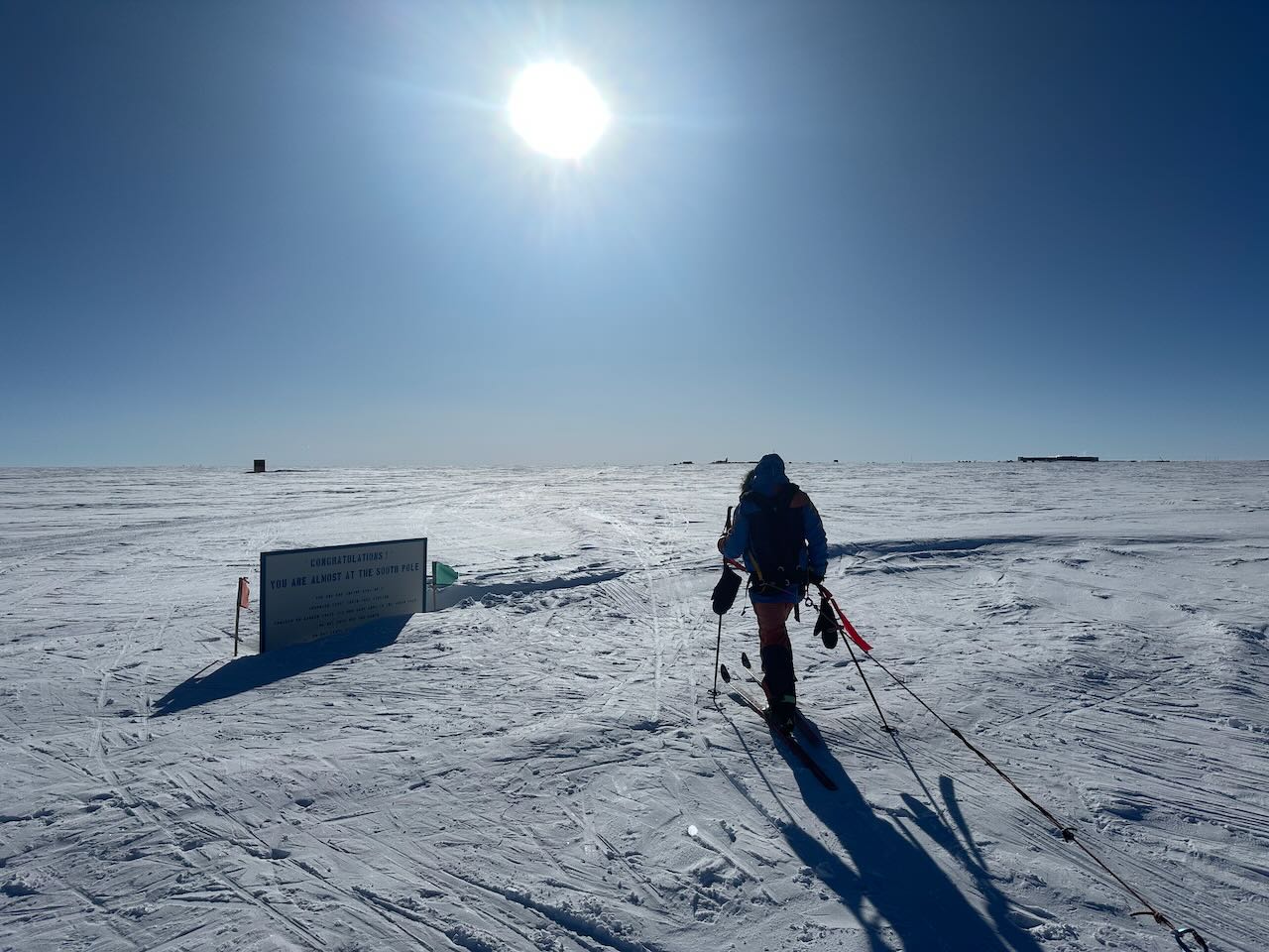 Ben Weber skiing towards the marker boards on the approach to the South Pole, during his solo expedition