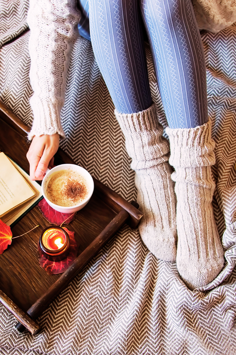 self care in the fall involves making your environment cozy, indulging in your favorite seasonal flavors, and practicing daily mindfulness