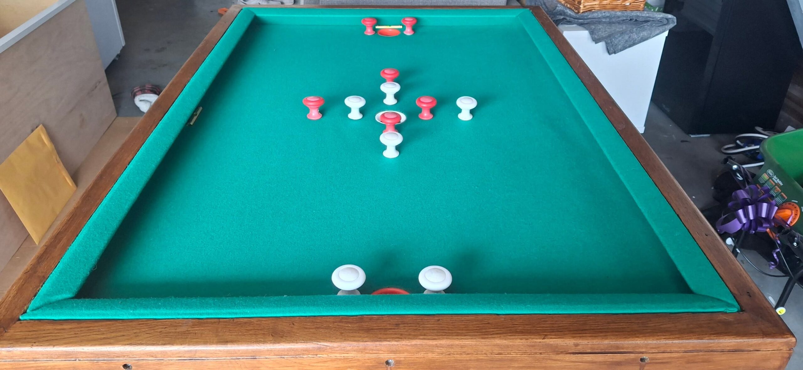 Bumper pool table restored with Championship Green cloth, new rubber and new pocket cups in Portland